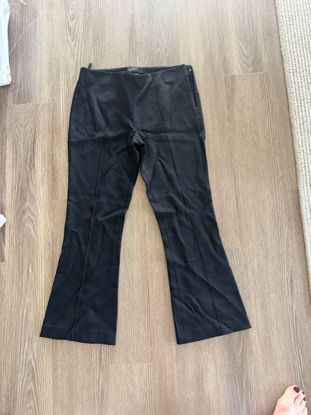 The row black ankle flare pants